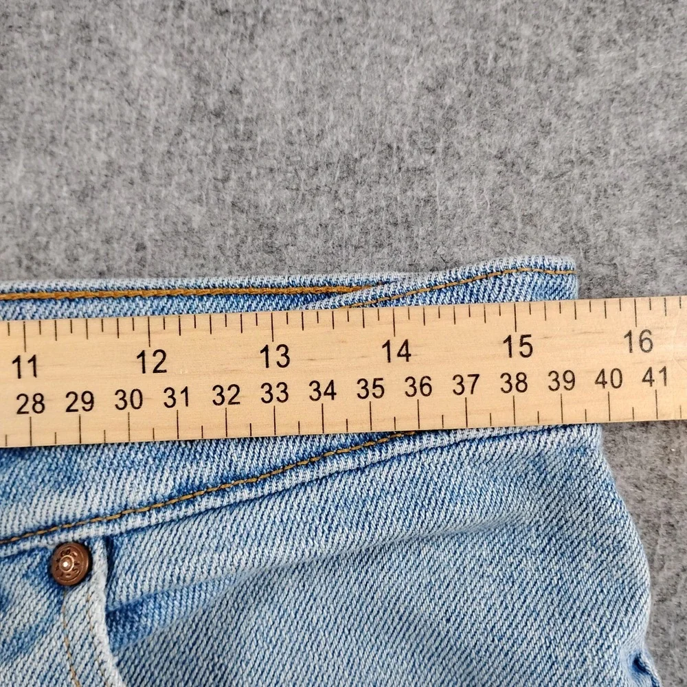 Vintage Levis 614 Orange Tab Jeans Mens 32x27 Light Wash Flex Made in USA Denim